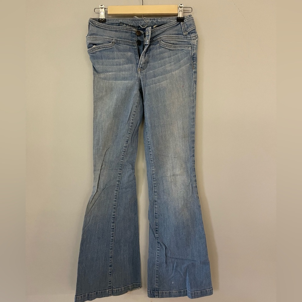 Juicy couture jeans. Ultra flare. Has some wear on the back bottom.